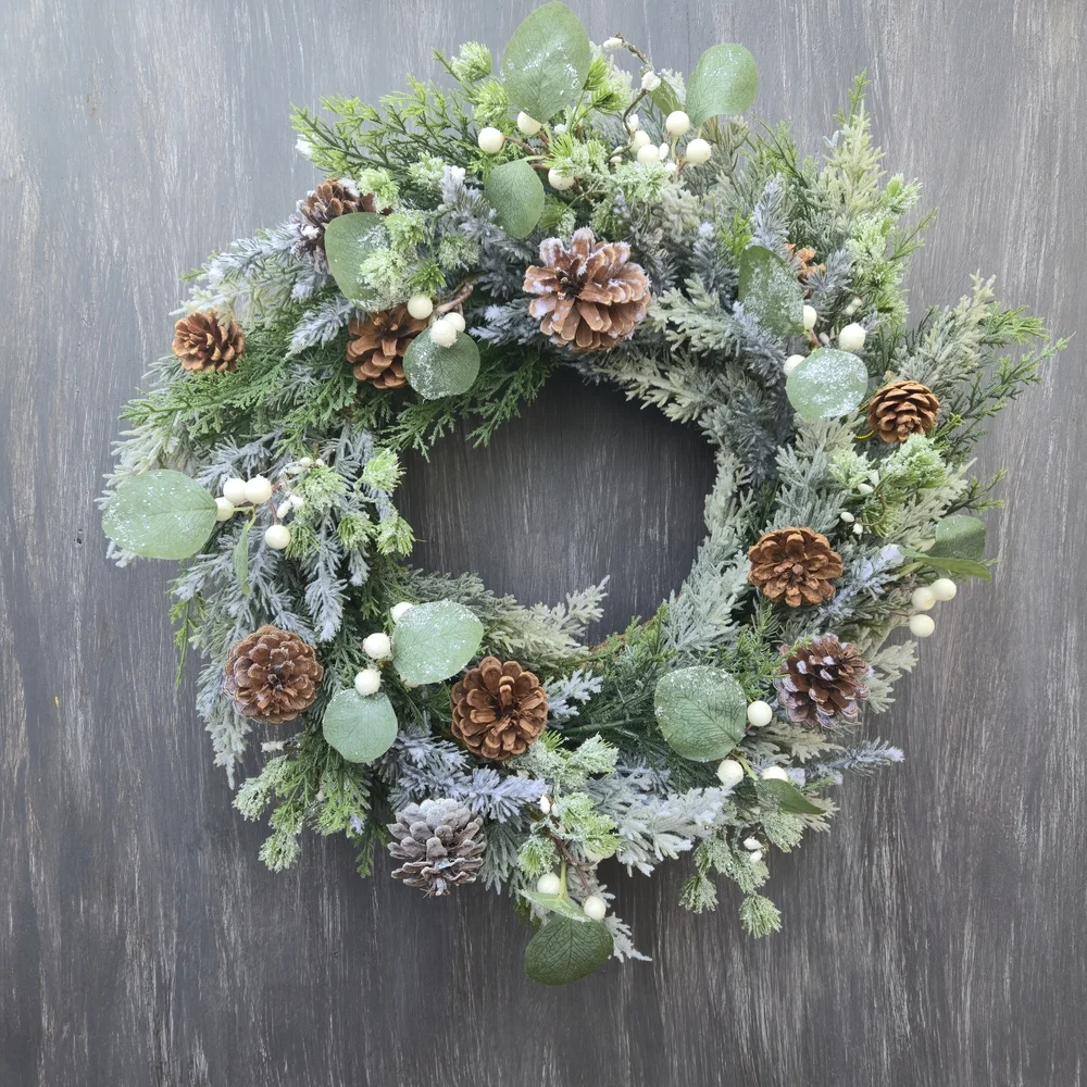 Handmade lush, artificial Winter Greenery Wreath With White And Brown Accents